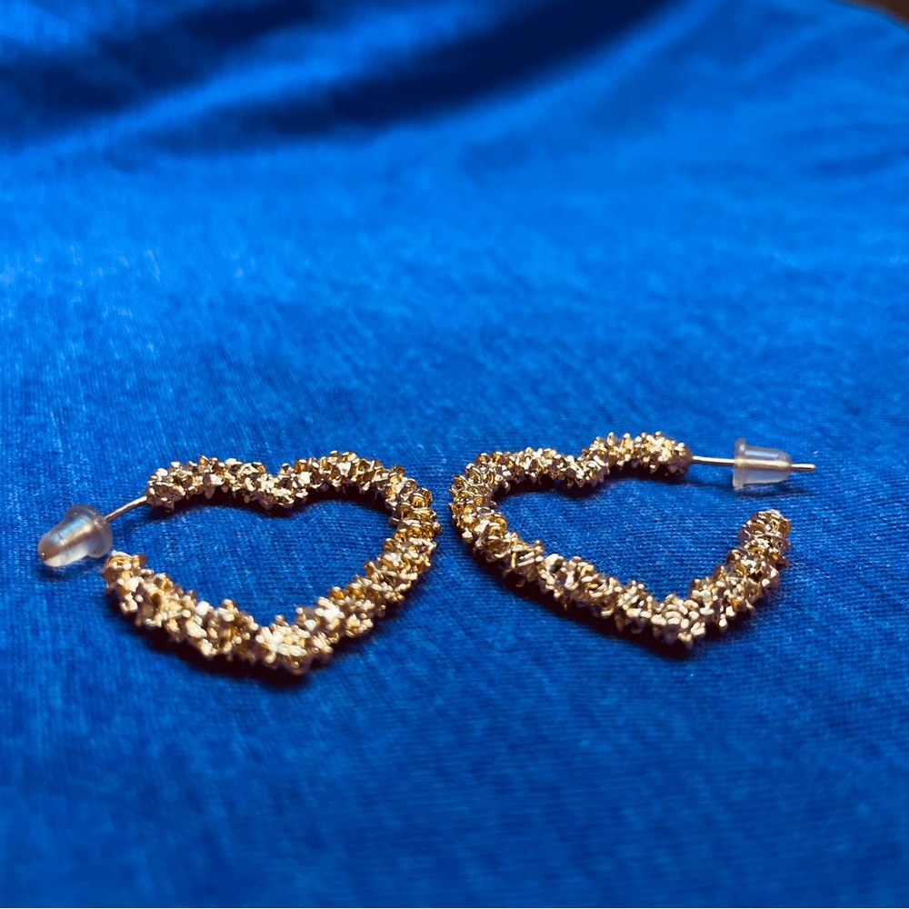 Golden heart shaped earrings